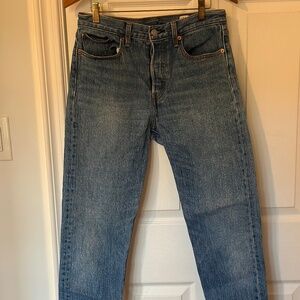 Levi's button fly, raw hem size 30 blue jeans